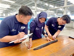 IMage 3 ARC Team checks adult eel